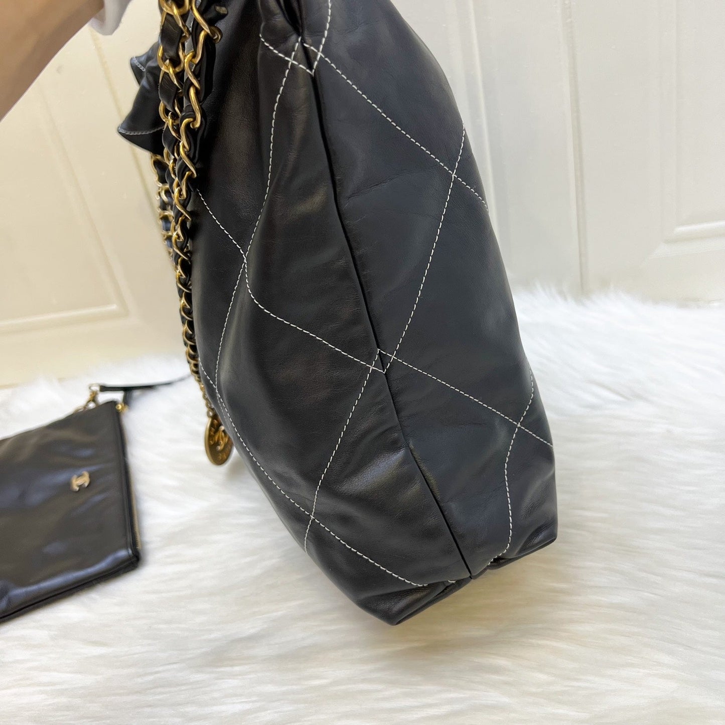 Chanel 22 Medium Hobo Handbag in Black Calfskin with White Stitch Quilting and AGHW (Model: )