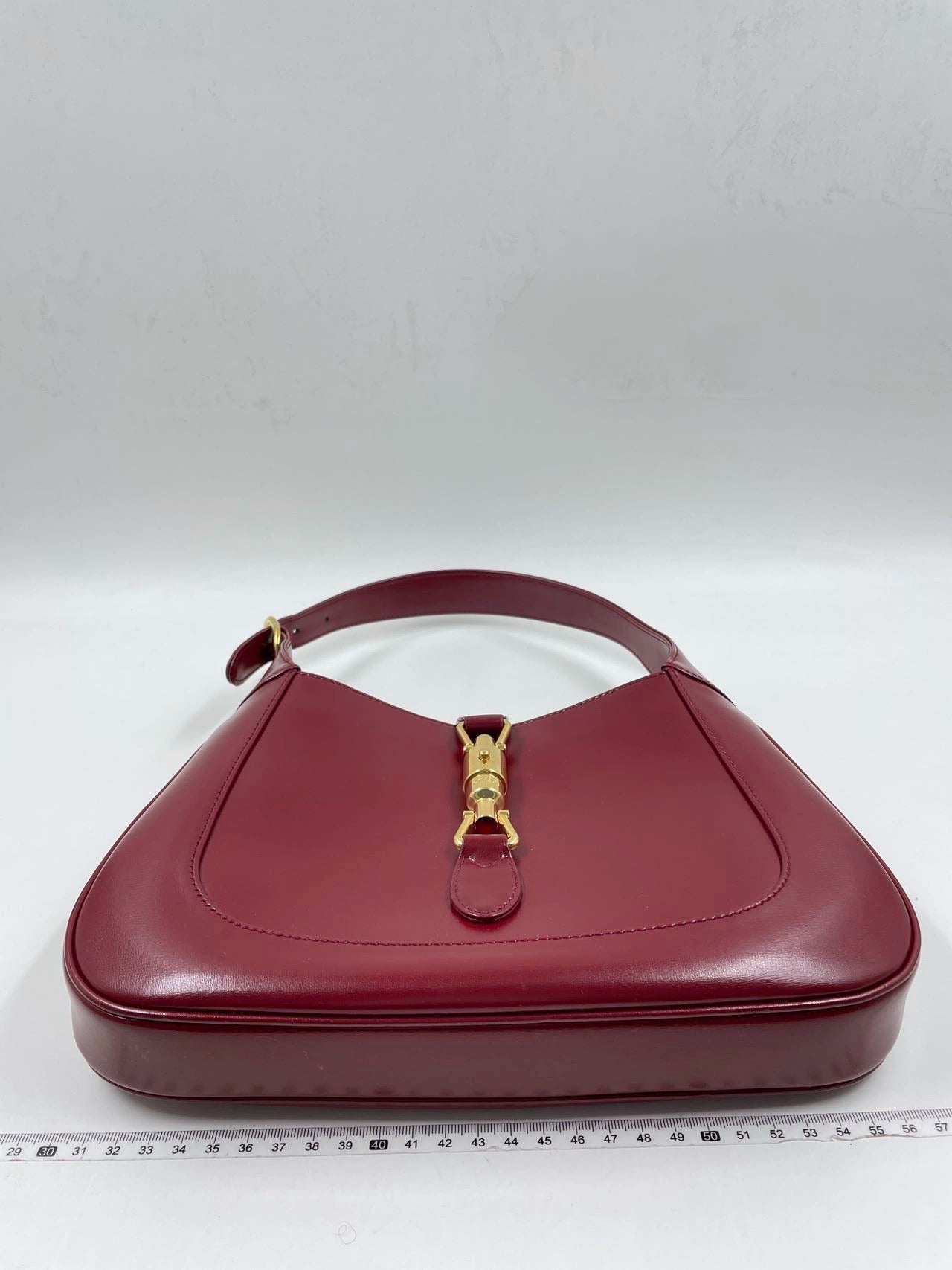 Gucci Jackie Burgundy Adjustable Strap Leather Handbag