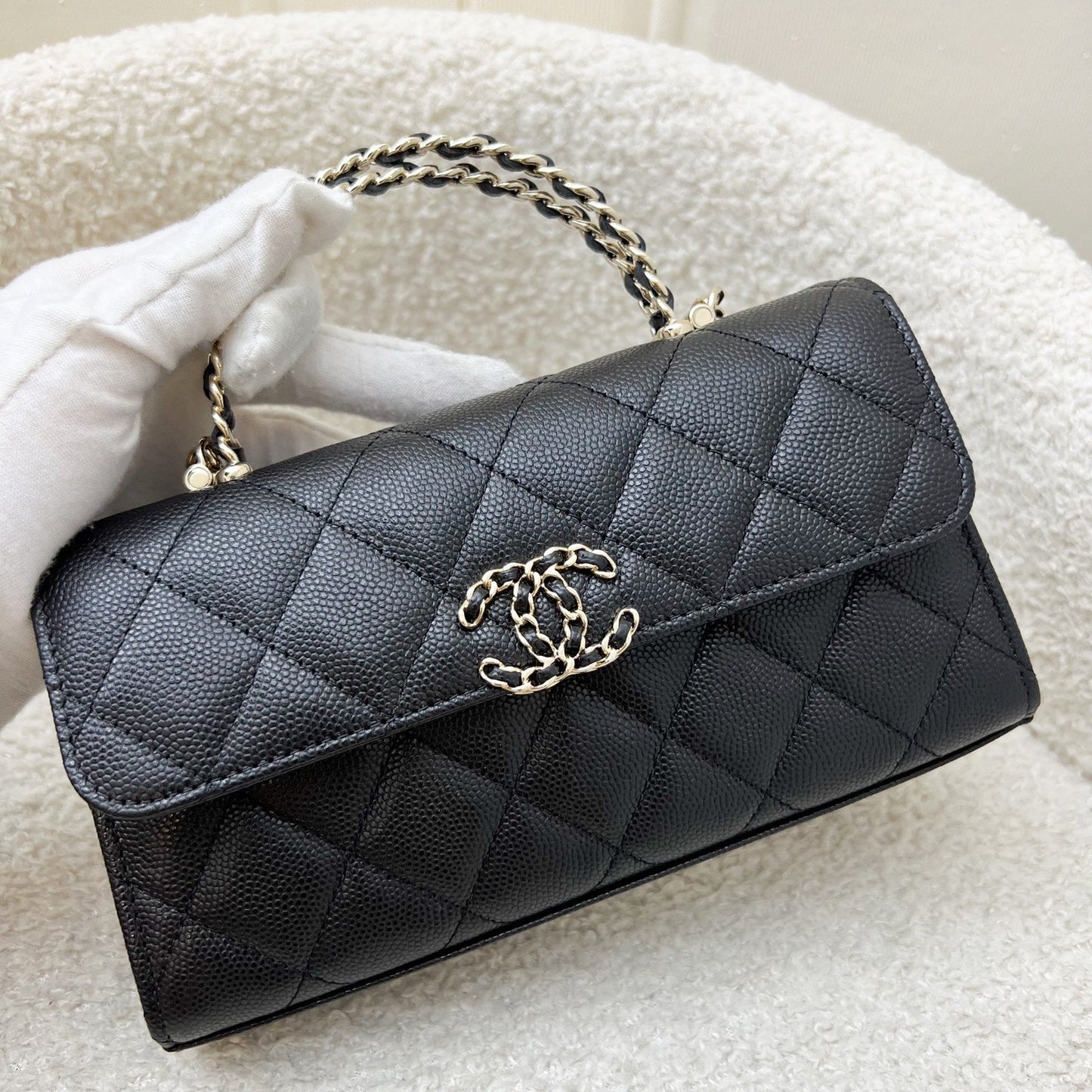 Top Handle Kelly Clutch with Chain in Black Caviar and GHW Signature