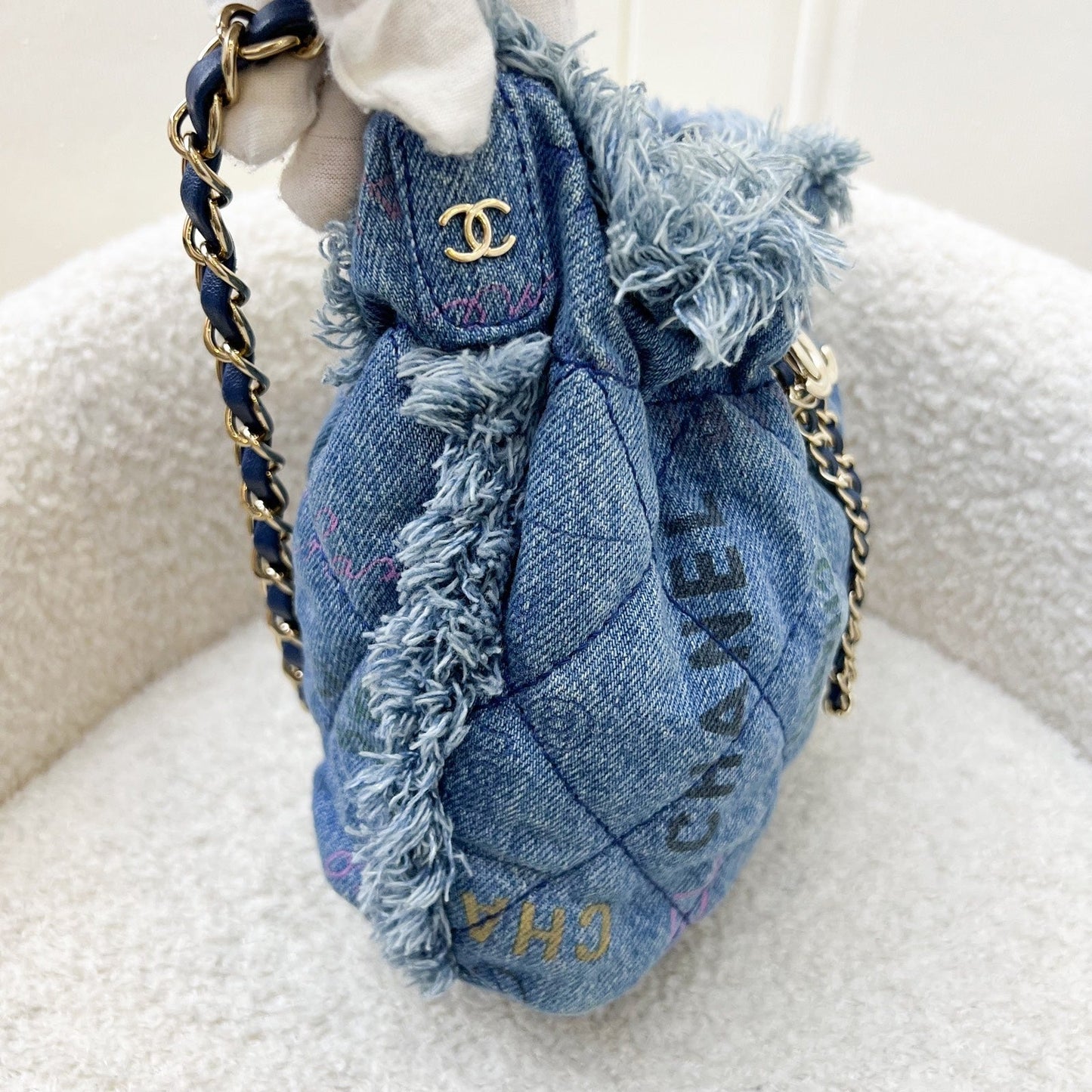 Chanel Denim Mood Mini Drawstring Bucket Bag in Blue Printed Denim and LGHW