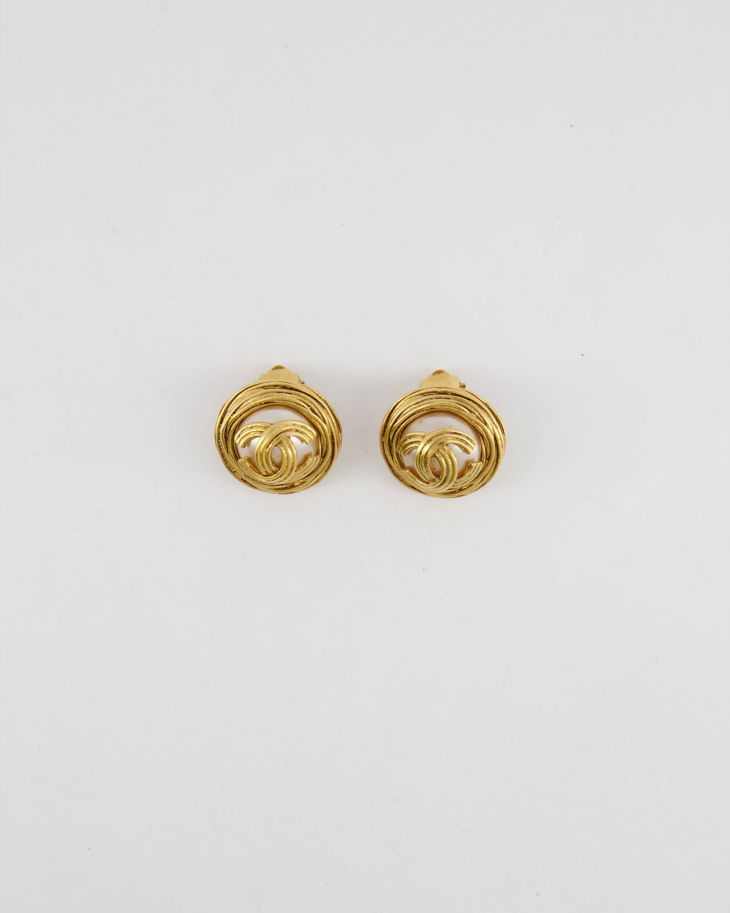 Chanel Gold Spiral Round Clip On Earrings with Embedded Pearl and Gold CC Logo Jewelry