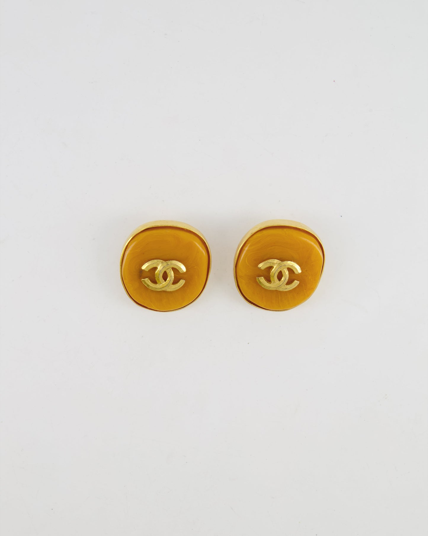 Chanel Orange Rounded Clip On Earrings with Gold Rim and CC Logo Detail Jewelry