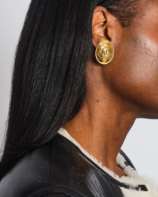 Chanel Gold Polished Oval Clip On Earrings with CC Logo Jewelry