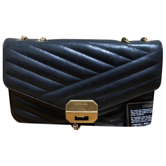 black leather handbag Refined