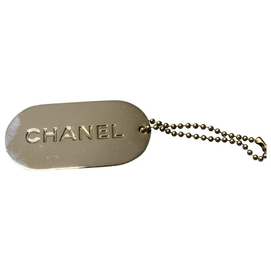 Chanel steel bag charms