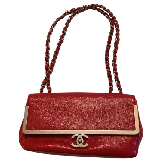 red leather handbag Signature