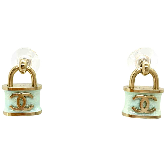 gold metal earrings Jewelry Refined