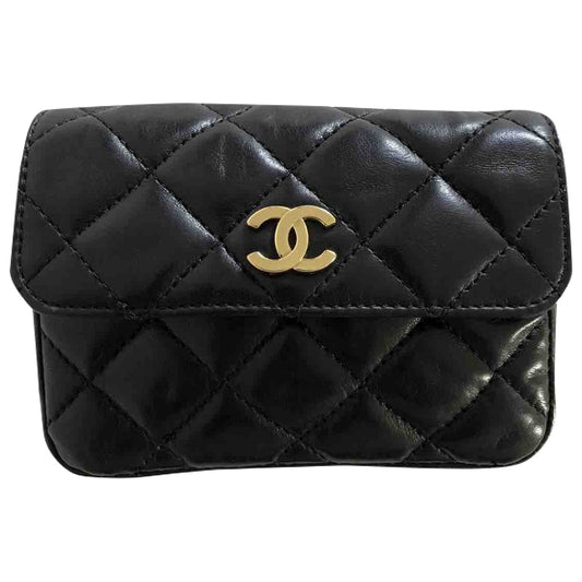 black leather clutch bag Signature