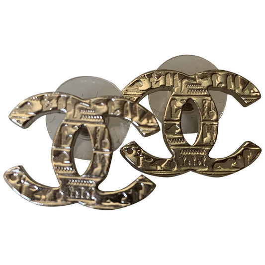 cc gold metal earrings Jewelry Heritage