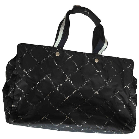 black cloth travel bag Signature
