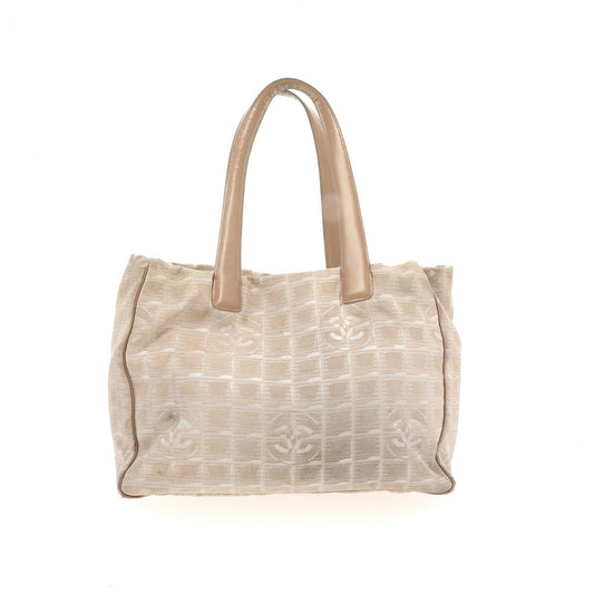 beige leather handbag Signature