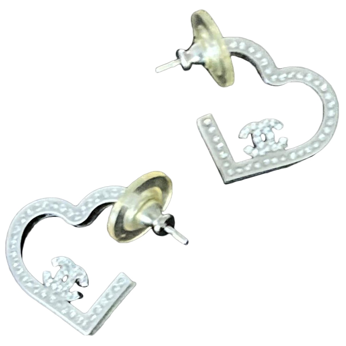 cc silver metal earrings Jewelry Boutique