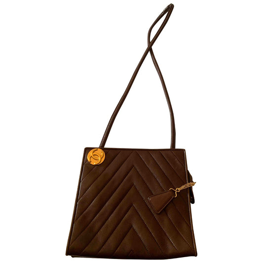 brown leather handbag Signature