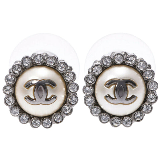 silver metal earrings Jewelry Refined
