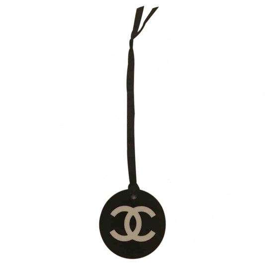 cc black plastic bag charms Signature
