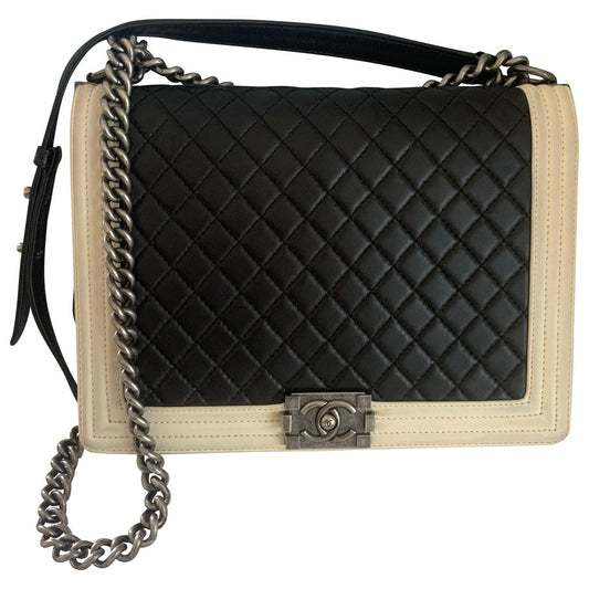 boy black leather handbag Statement