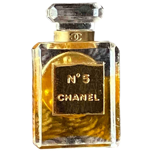 Chanel gold plastic pins & brooches Jewelry
