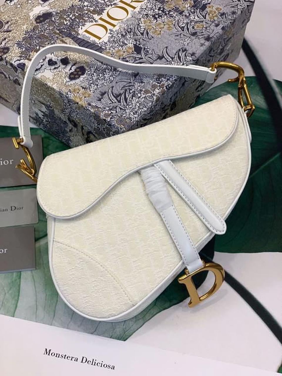 Saddle Oblique Embroidered Toned Hardware Canvas White Gold Travel Bag