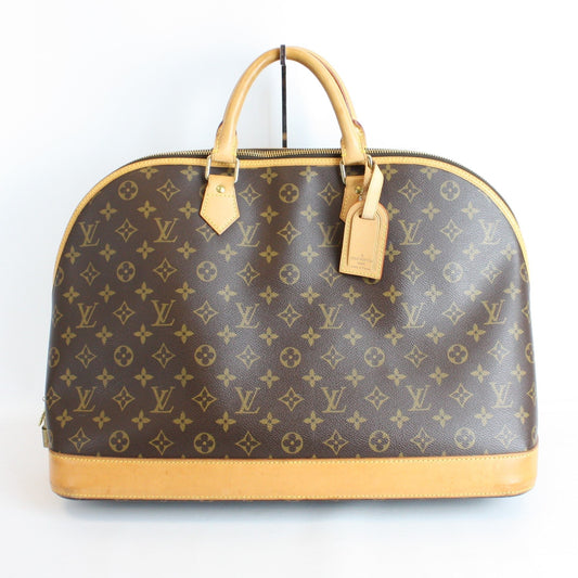 Louis Vuitton ALMA VOYAGE Monogram Handbag