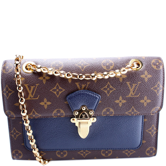 Louis Vuitton Victoire Monogram Handbag