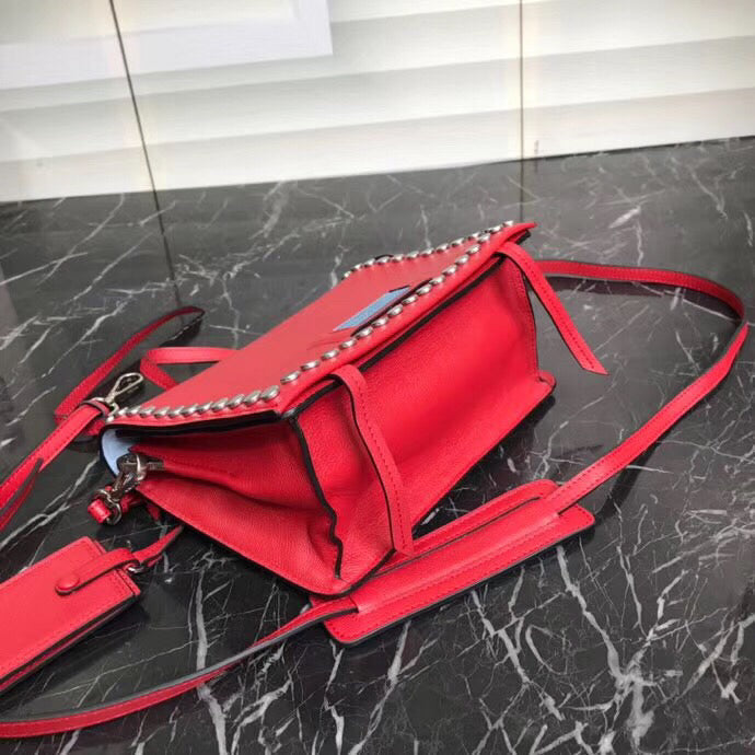 Prada Etiquette Bag In Calfskin With Stud Trim Metal Red Travel Bag