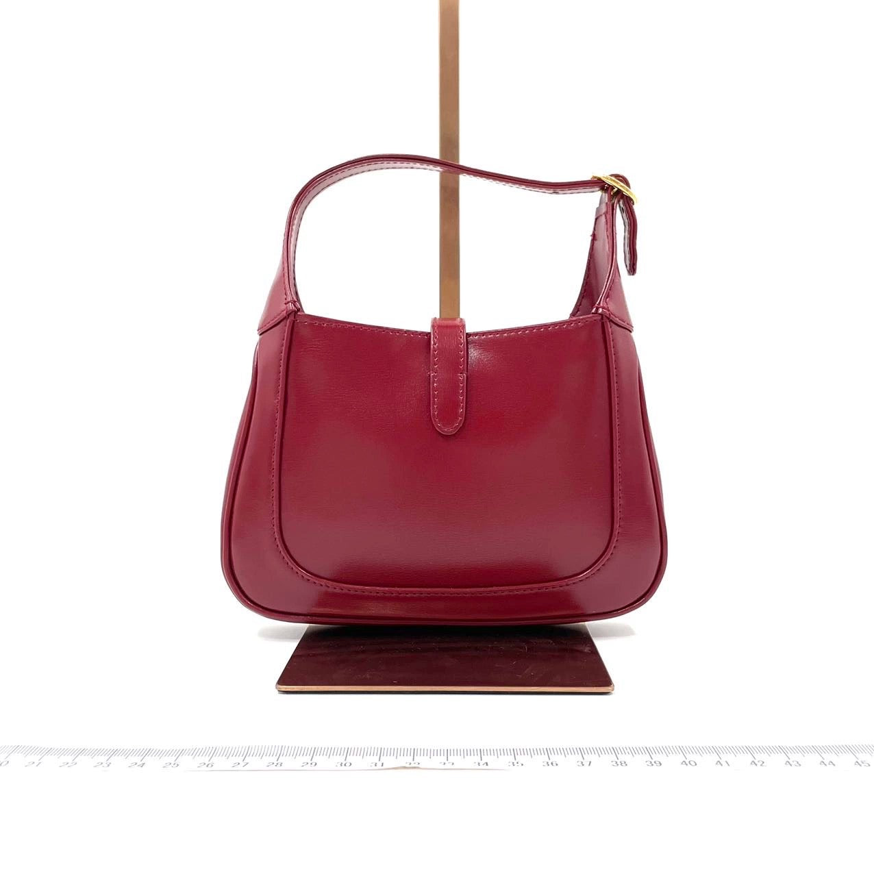 Gucci Jackie Burgundy Adjustable Strap Leather Mini Travel Bag