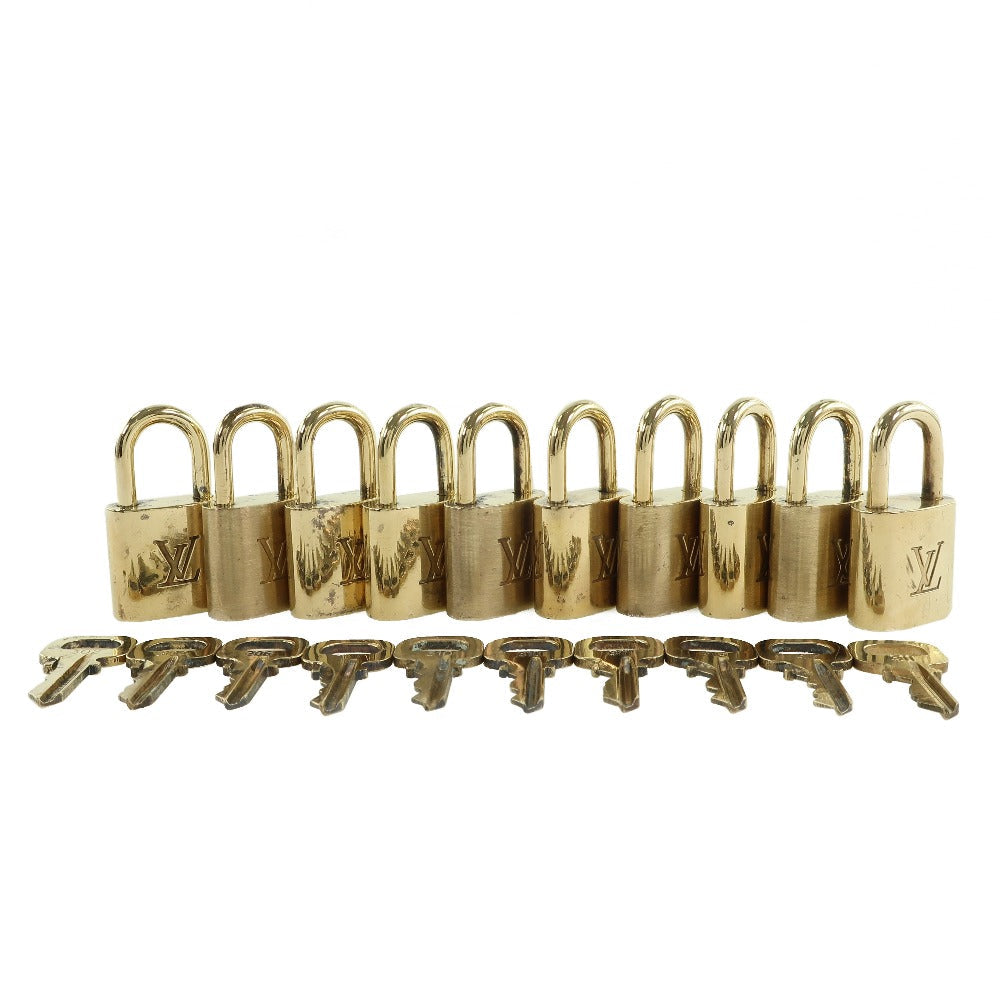 Louis Vuitton Cadena brass 10 pieces set Gold Handbag