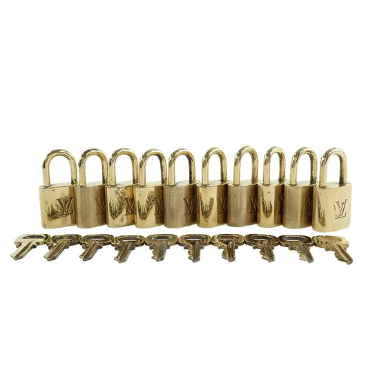 Louis Vuitton Cadena brass 10 pieces set Gold Handbag