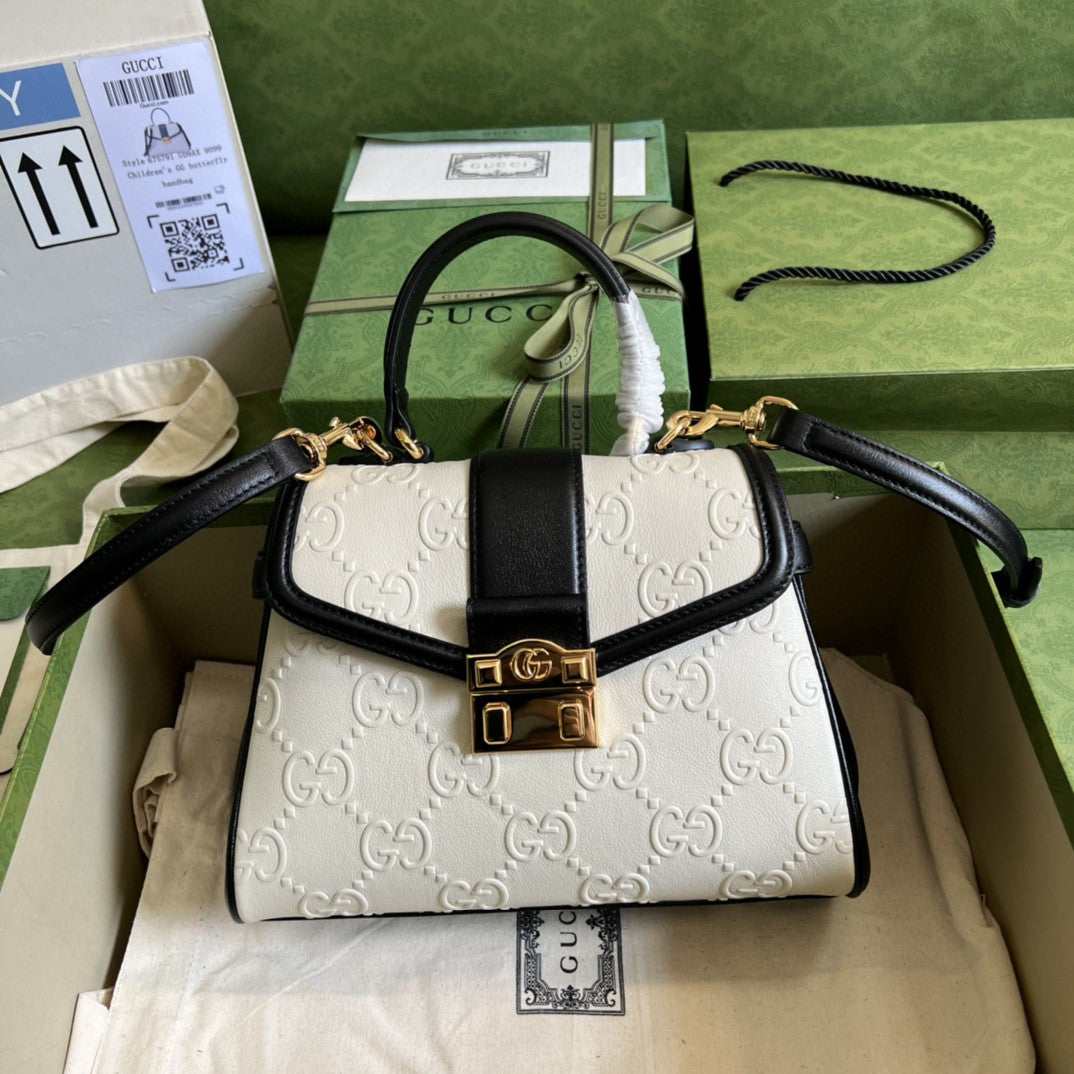 gg Debossed gg 11in 29cm White Small Top Handle Handbag
