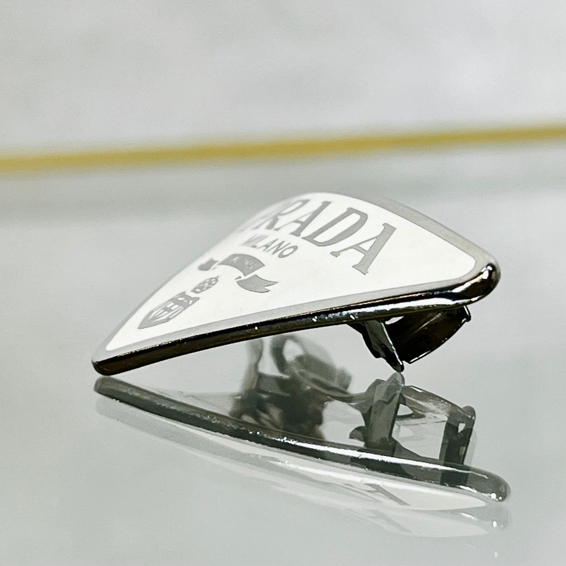 Prada Enamel Triangle Hair Clip Luxury Handbag Metal White Silver Travel Bag
