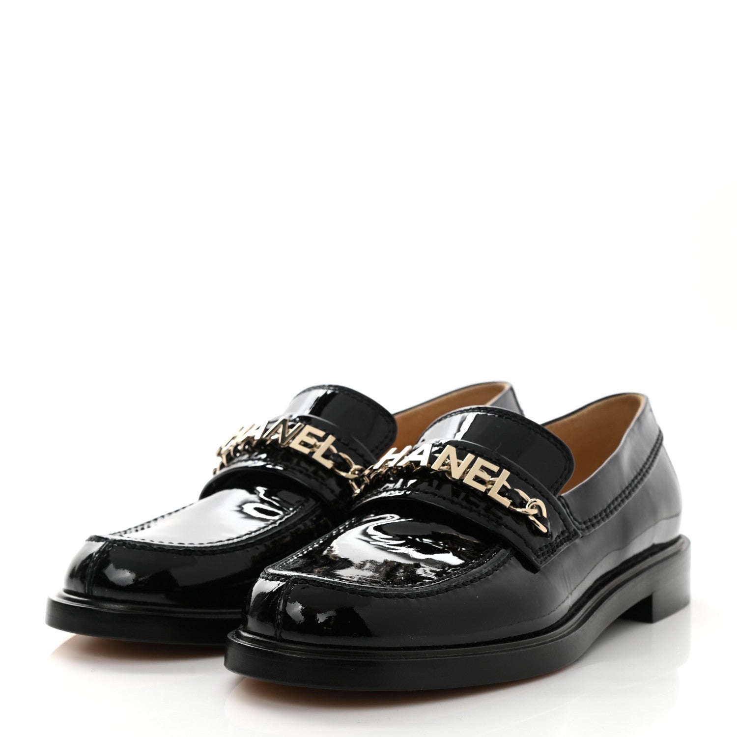 CHANEL SHINY PATENT CALFSKIN LOGO LOAFERS