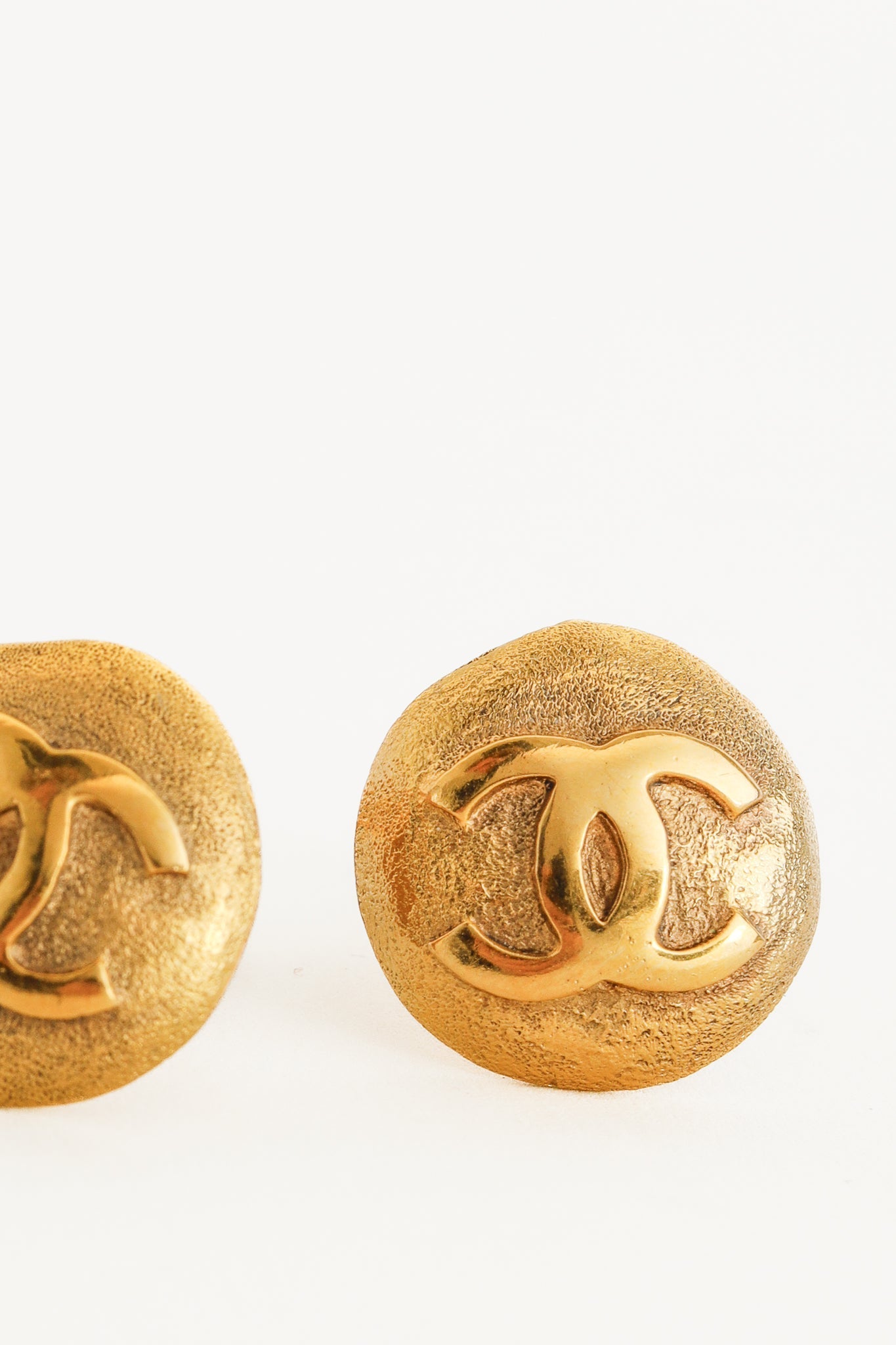 Chanel Gold-Tone Round Interlocking CC Clip-On Earrings Jewelry