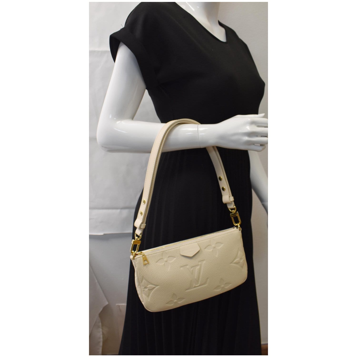 Louis Multi Pochette Accessories Empreinte Shoulder Bag Cream