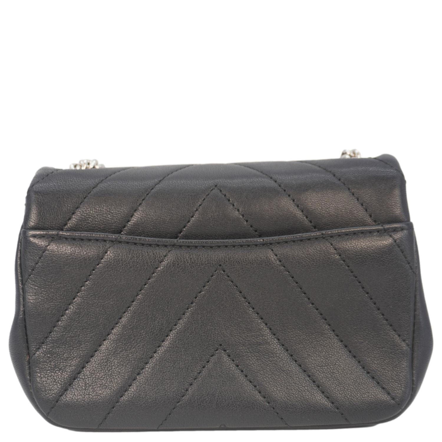 Chanel Flap Quilted Chevron Leather Black Travel Bag