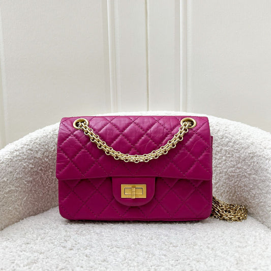 Chanel Classic 2.55 Reissue Mini Flap in Pink Distressed Calfskin and AGHW Accessory