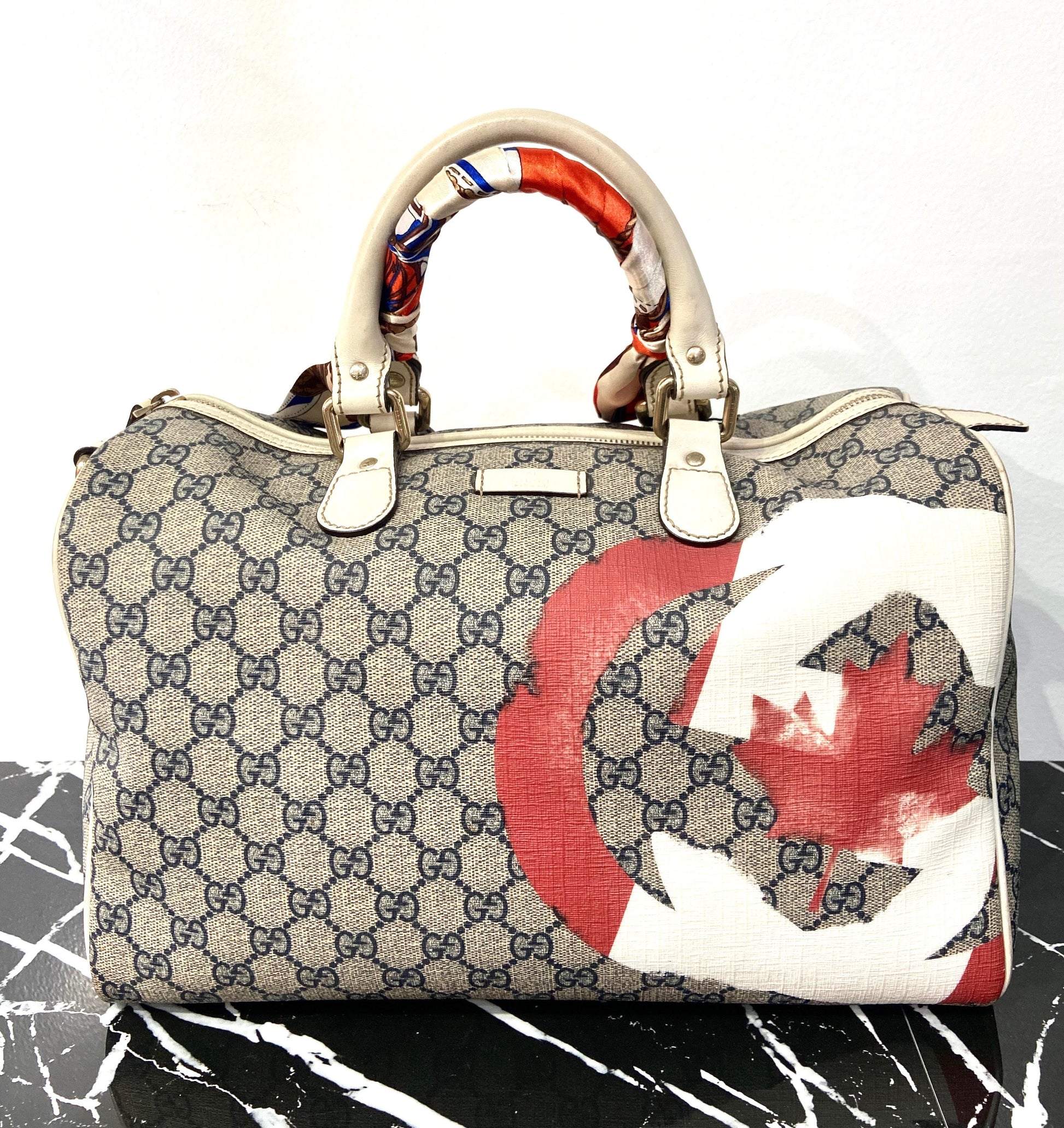 Gucci GG SUPREME CANADIAN FLAG JOY Travel Bag