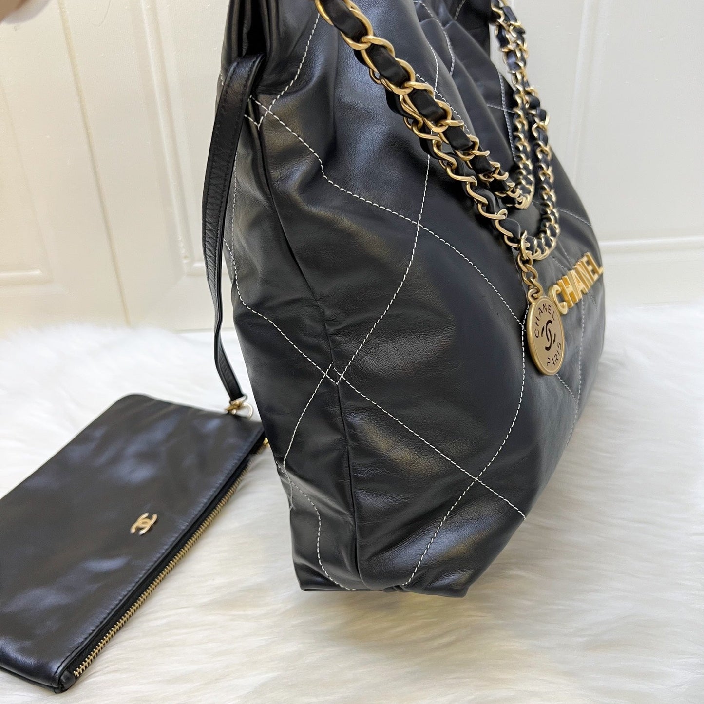Chanel 22 Medium Hobo Handbag in Black Calfskin with White Stitch Quilting and AGHW (Model: )