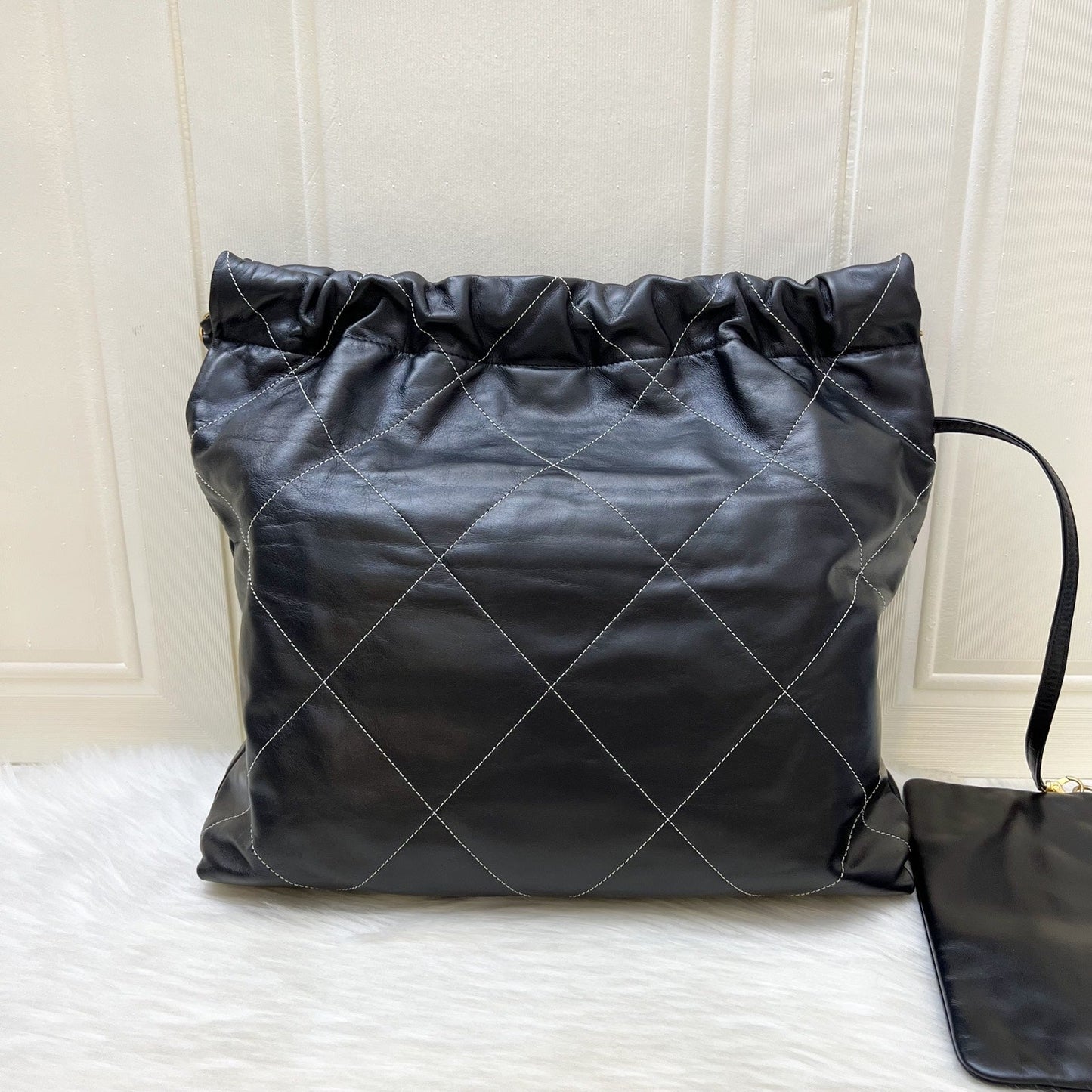Chanel 22 Medium Hobo Handbag in Black Calfskin with White Stitch Quilting and AGHW (Model: )