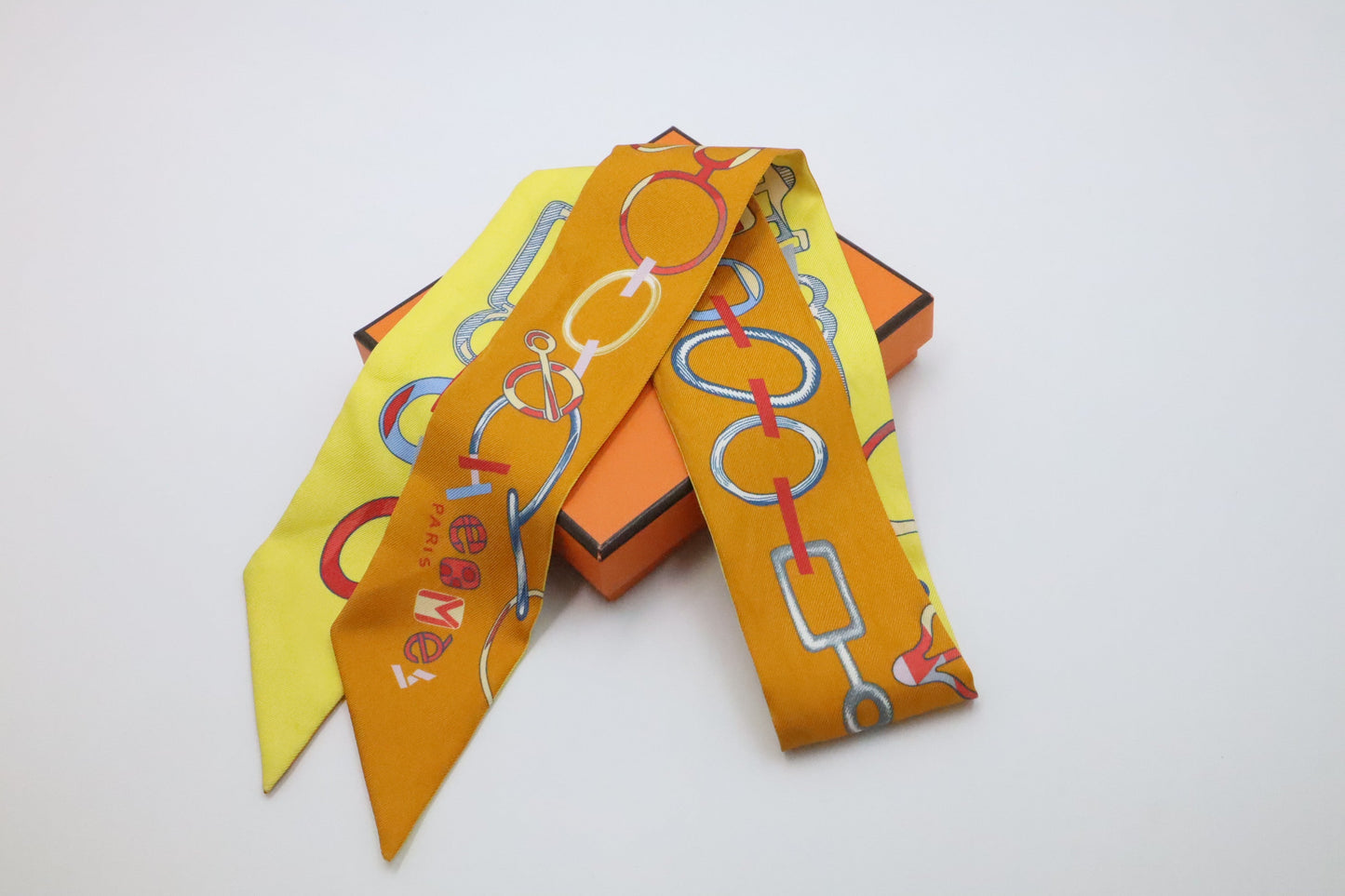 Hermes Twilly 'Do Re Boucles' In Orange & Travel Bag