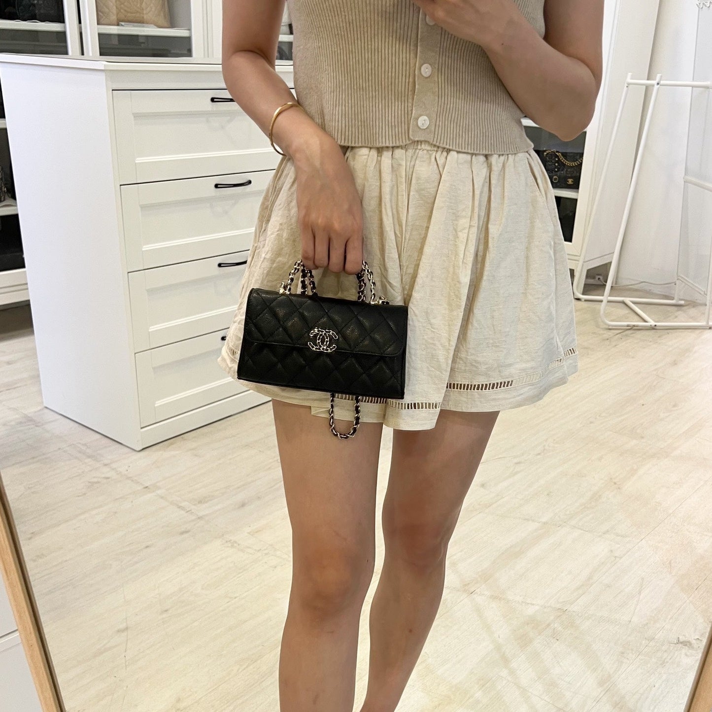 Top Handle Kelly Clutch with Chain in Black Caviar and GHW Signature