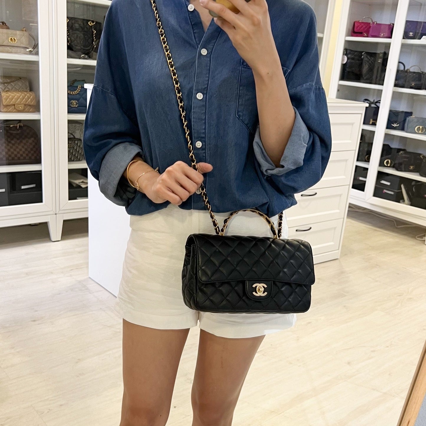 Chanel Small Flap with Top Handle in Black Lambskin and AGHW (Model: ) Bag