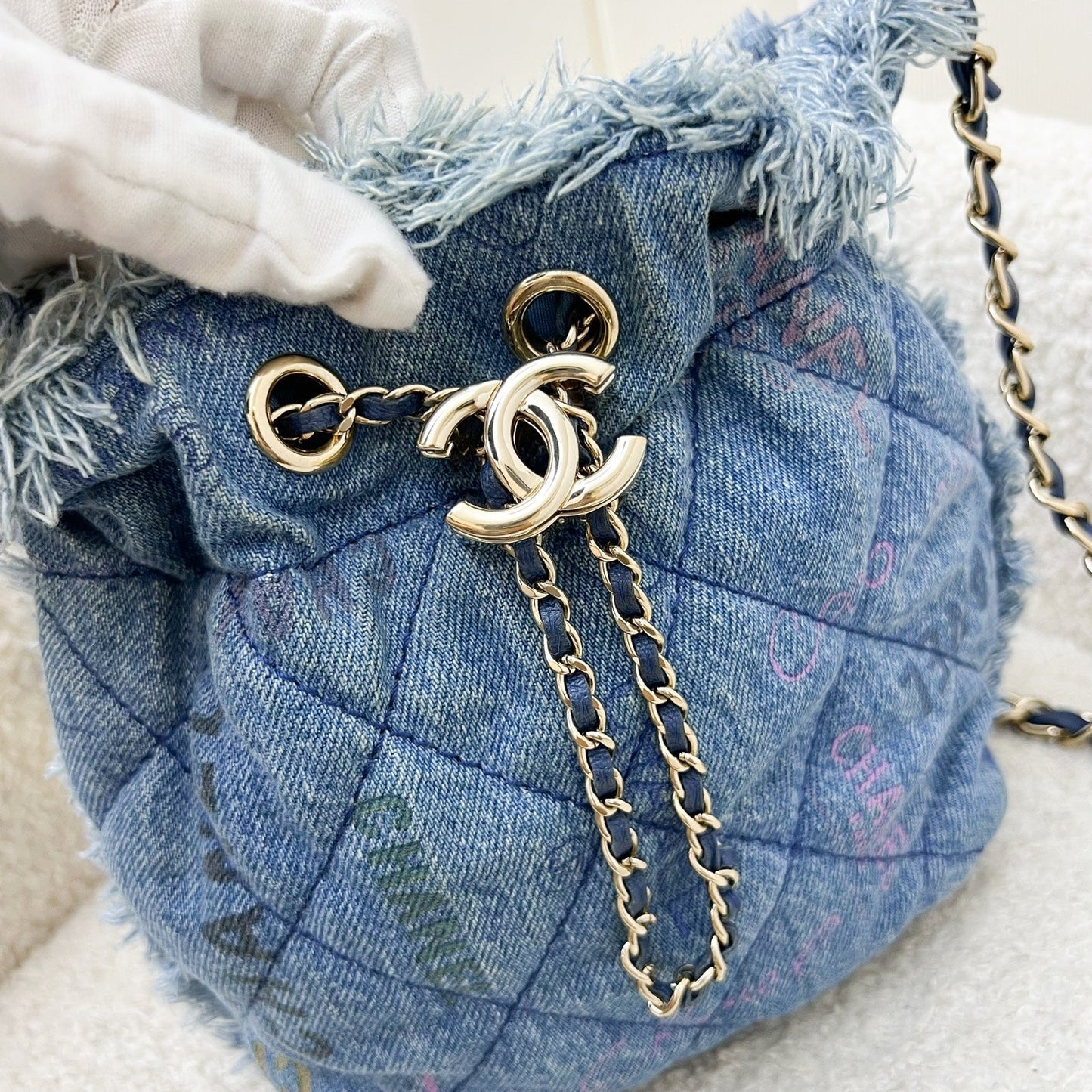 Chanel Denim Mood Mini Drawstring Bucket Bag in Blue Printed Denim and LGHW