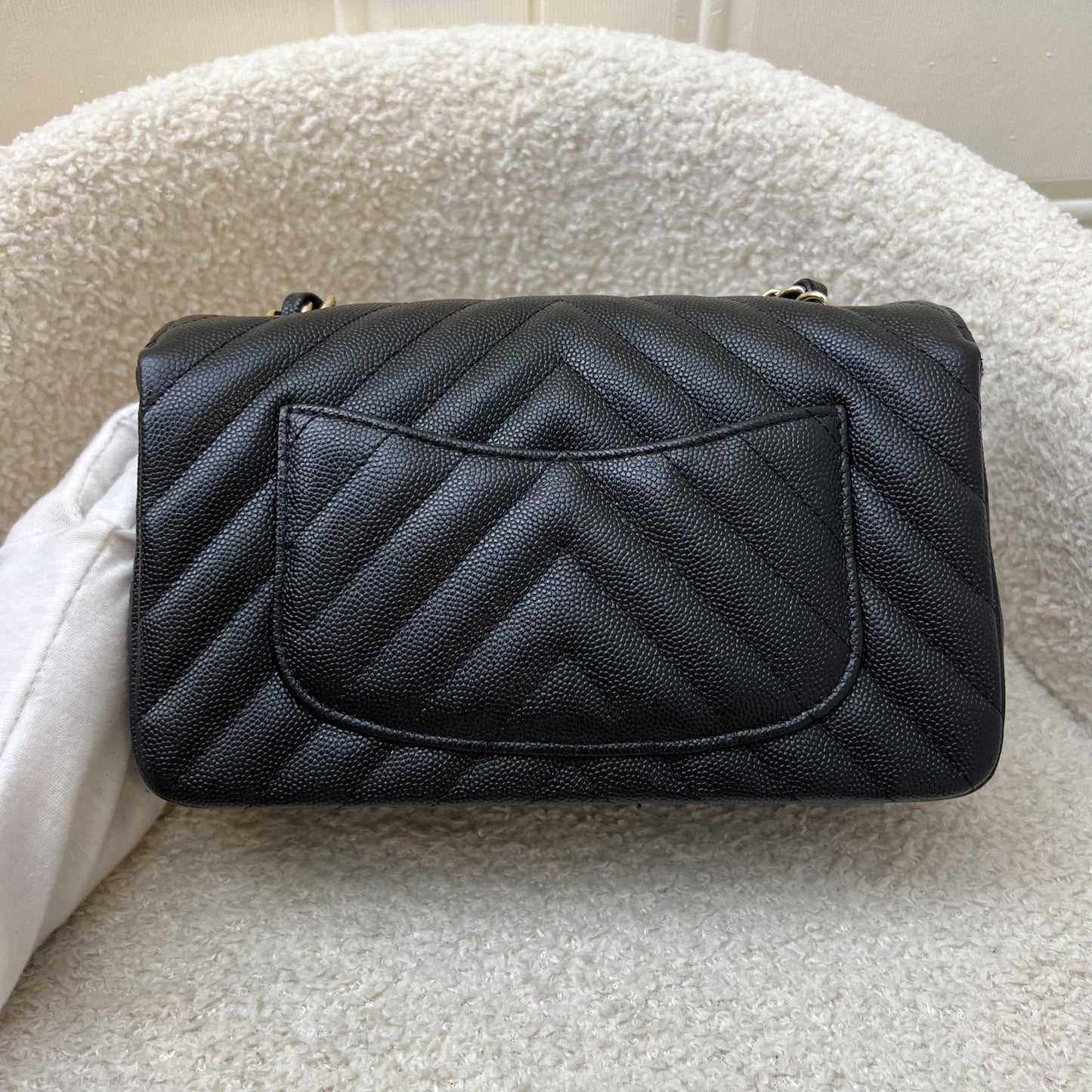 Chanel Classic Mini Rectangle Flap in Chevron Quilted Black Caviar and LGHW Accessory