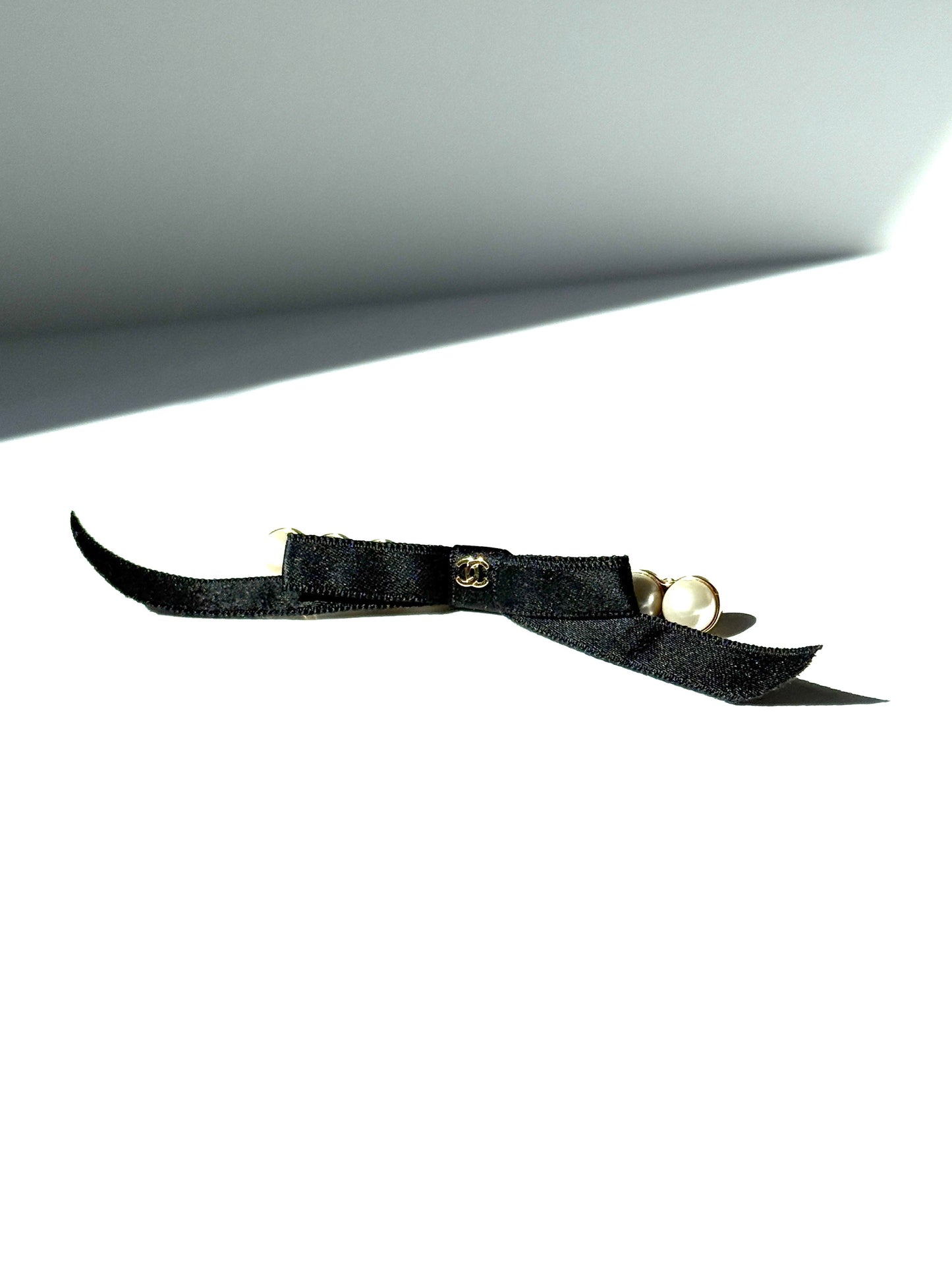 Chanel Black Faux Pearl Bow CC Logo 2025 Gold hardware Hair Barrette Clip Accessory