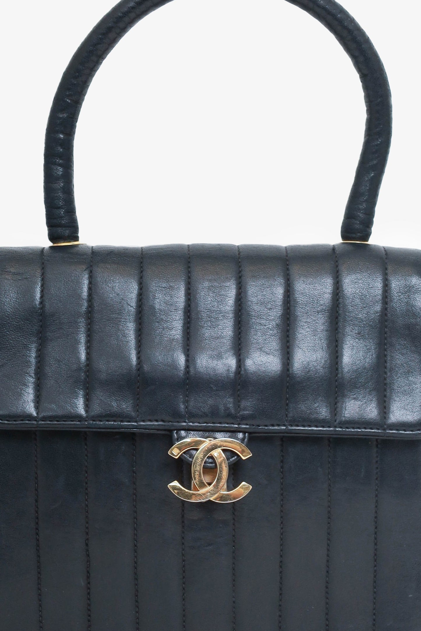 Chanel ™ 1991-94 Black Vertical Quilted Lambskin Top Handle Bag