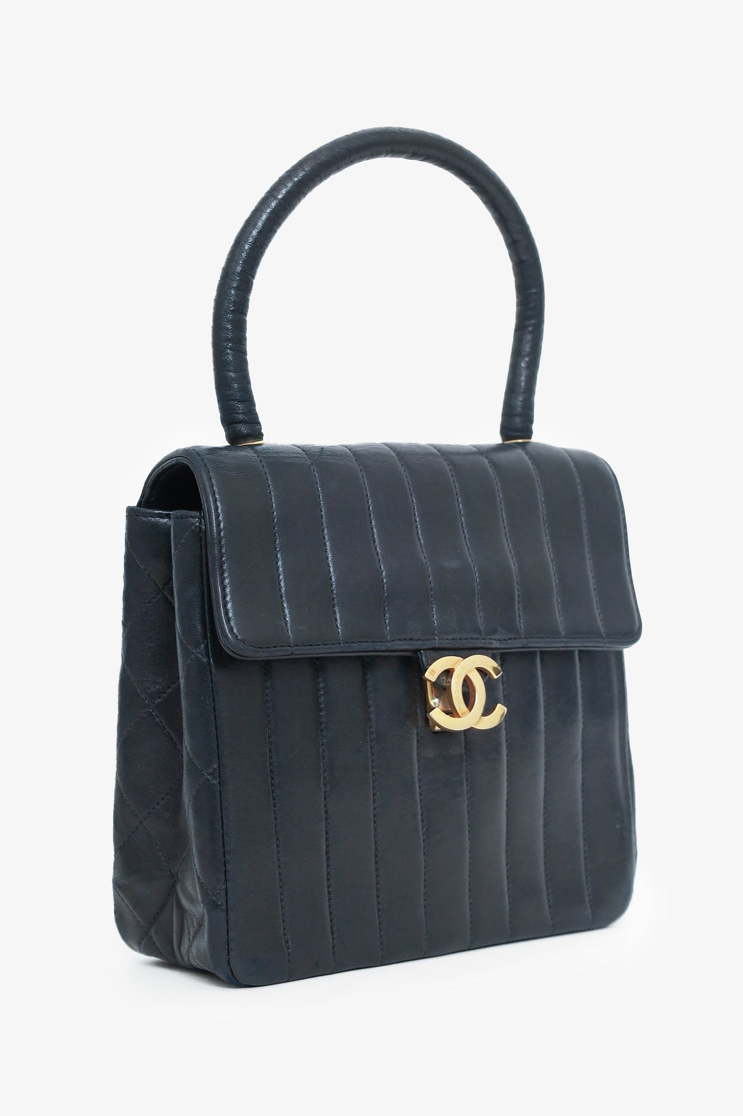 Chanel ™ 1991-94 Black Vertical Quilted Lambskin Top Handle Bag