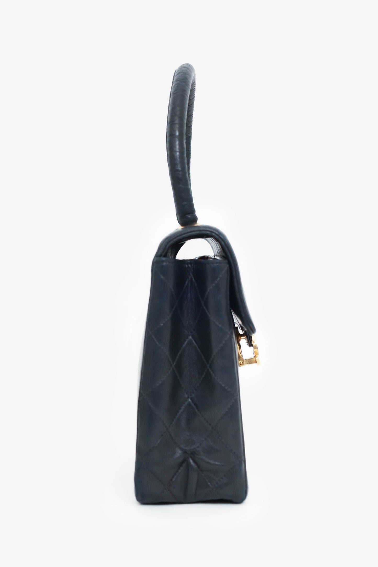 Chanel ™ 1991-94 Black Vertical Quilted Lambskin Top Handle Bag