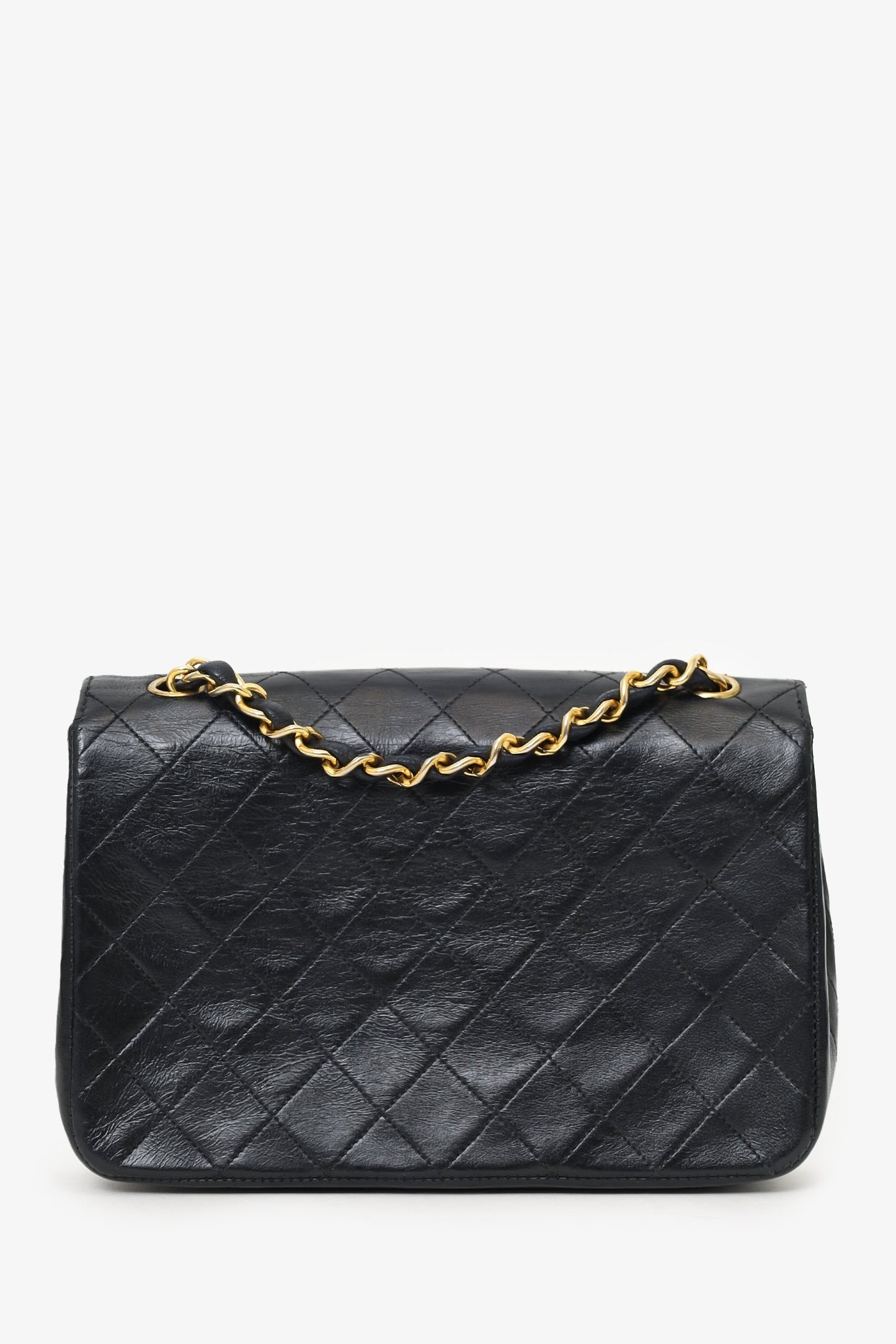 Chanel ™ 1986-88 Black Quilted Lambskin Circle CC Mini Flap Bag