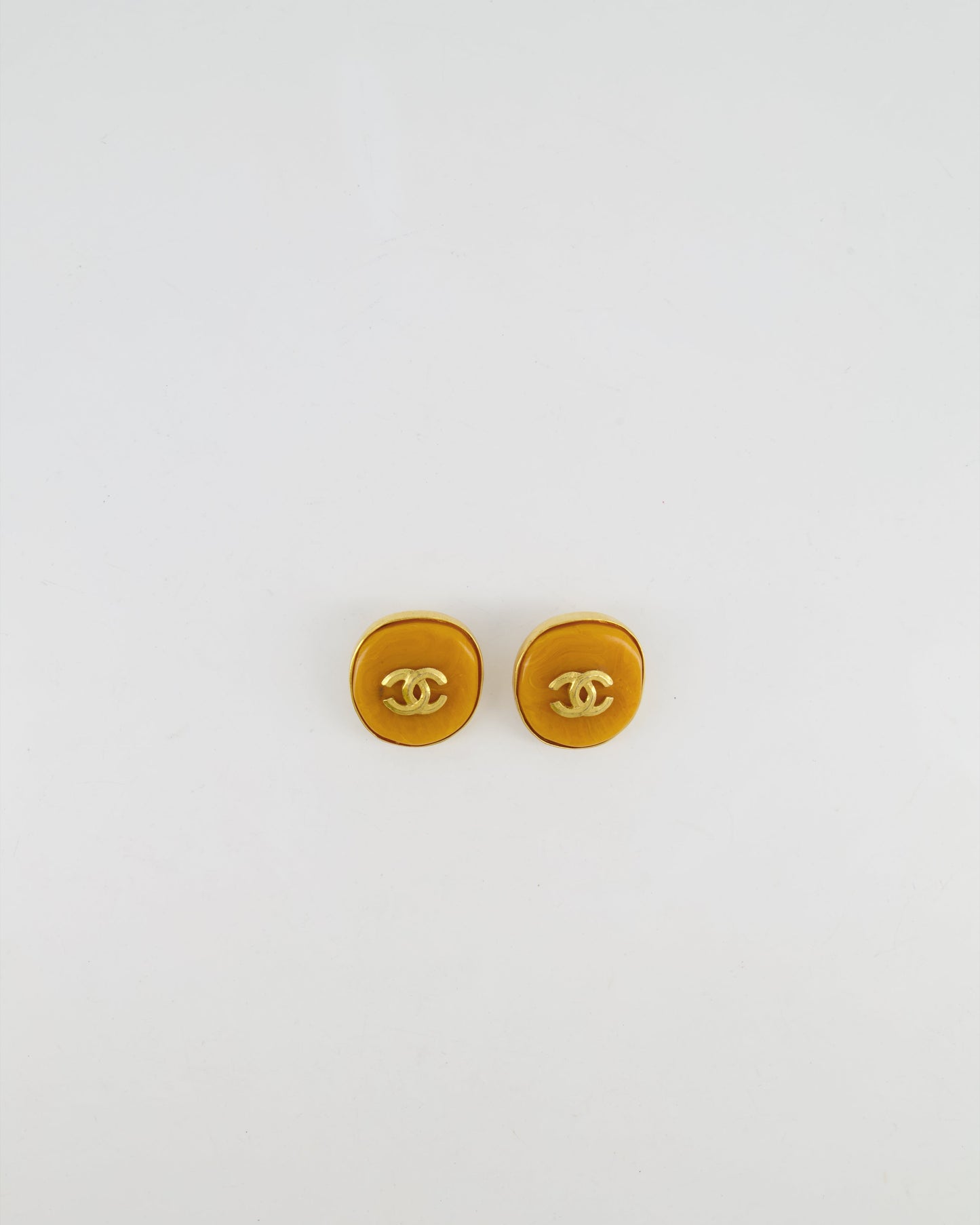 Chanel Orange Rounded Clip On Earrings with Gold Rim and CC Logo Detail Jewelry