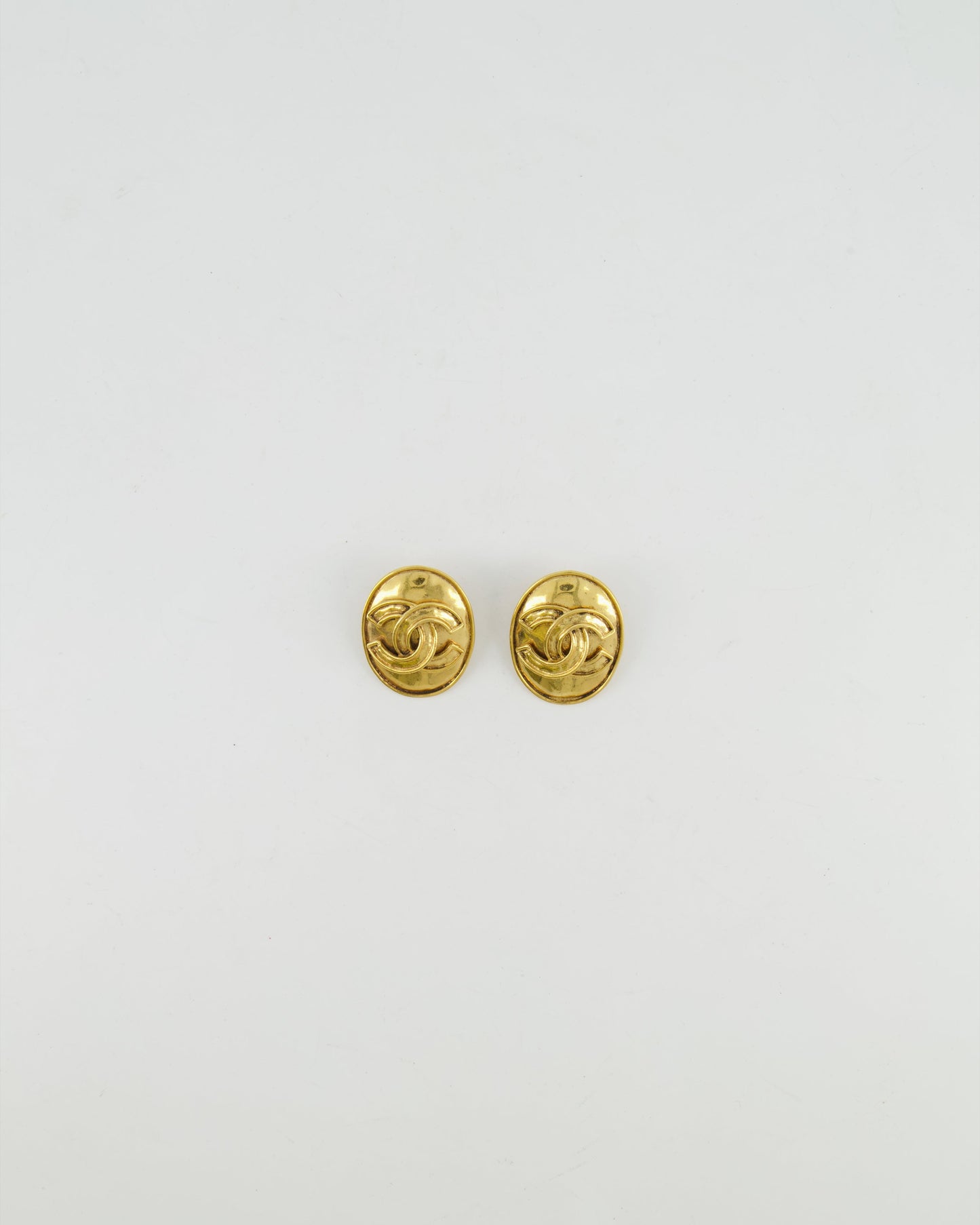 Chanel Gold Polished Oval Clip On Earrings with CC Logo Jewelry